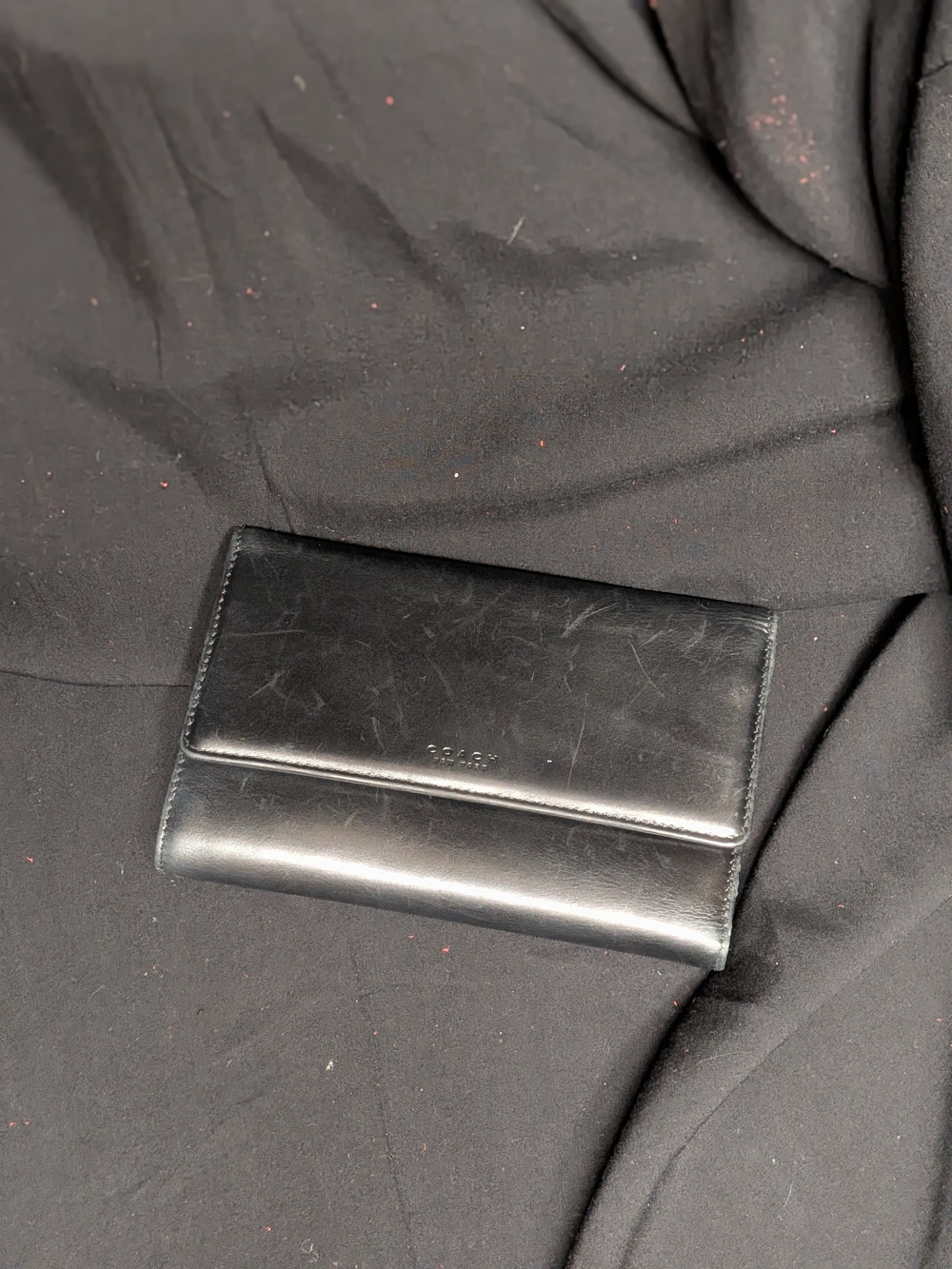 Coach Black Leather Fold Wallet with Embossed Logo